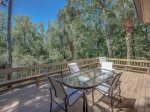 Outdoor Dining Table with Lagoon Views at 28 Shell Ring
